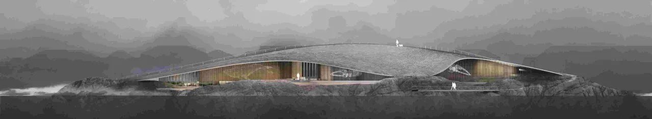 Wide view of a sleek curved-roof building on rocky terrain, with misty mountains in the gray background.