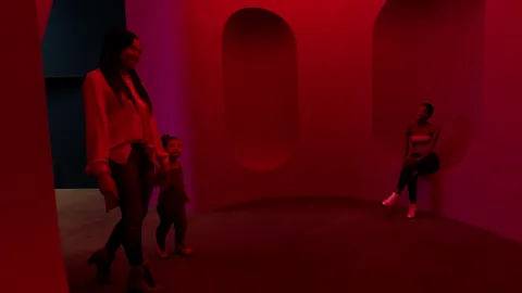 People walking through red room